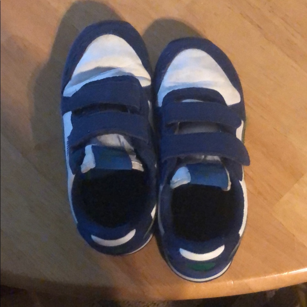 Puma white, green, and blue tennis shoes